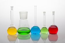 Laboratory Glassware With Liquids Of Different Colors Stock Photo
