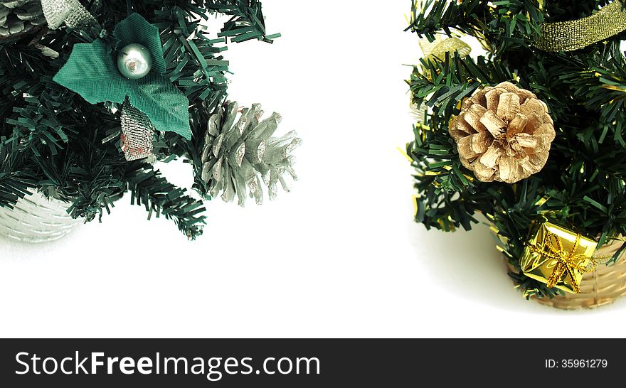 Fake new year trees and Cones in pine on white background.
