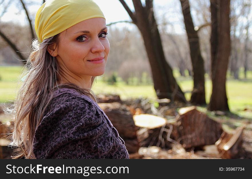Beautiful Girl With A Scarf On Her Head On A Background Of Nature