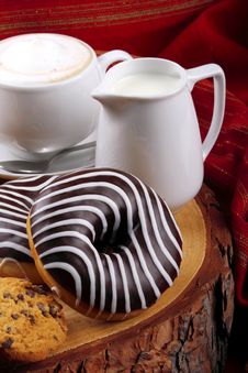 Chocolate Donuts And Cappuccino Royalty Free Stock Image