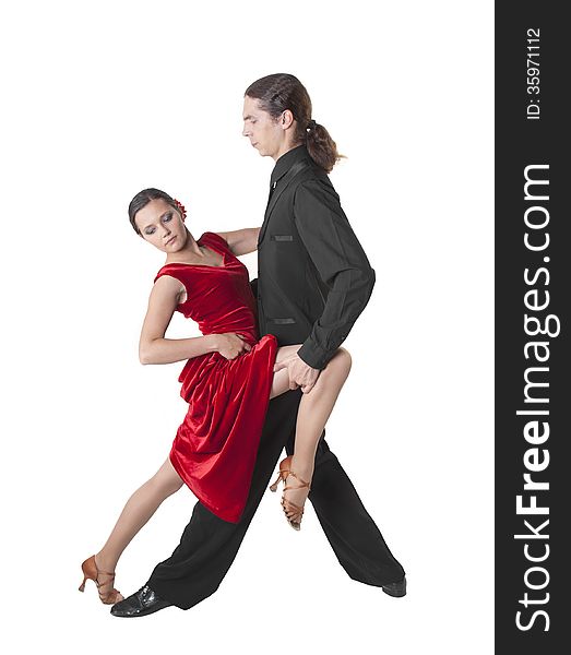 Young couple dancing tango isolated over white