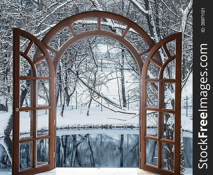 Open door and a winter forest