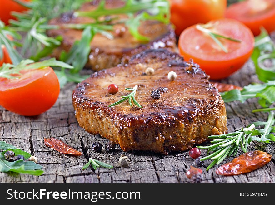 Steak with tomatoes and arugula. Steak with tomatoes and arugula