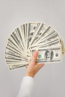 A Young Woman With Dollars In Her Hands, Isolated On White Royalty Free Stock Photo A Young Woman With Dollars In Her Hands, Isolated On White Royalty Free Stock Photo