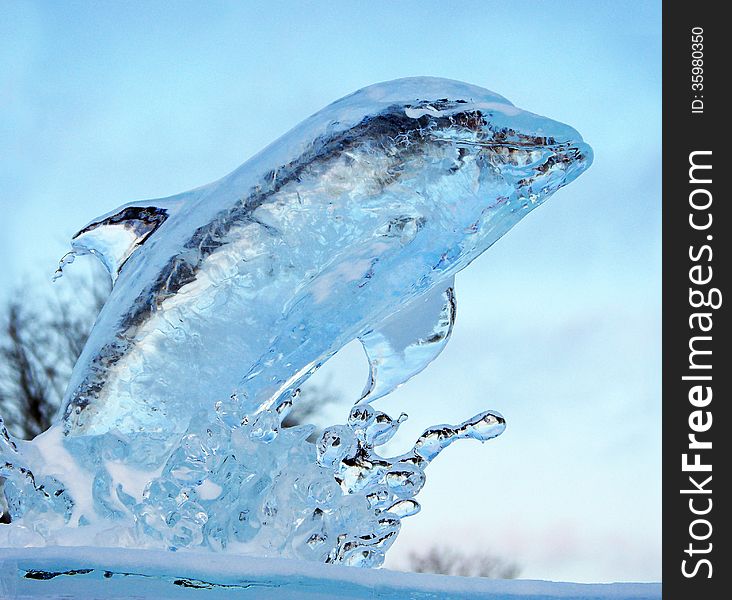 Light blue ice dolphin sculpture