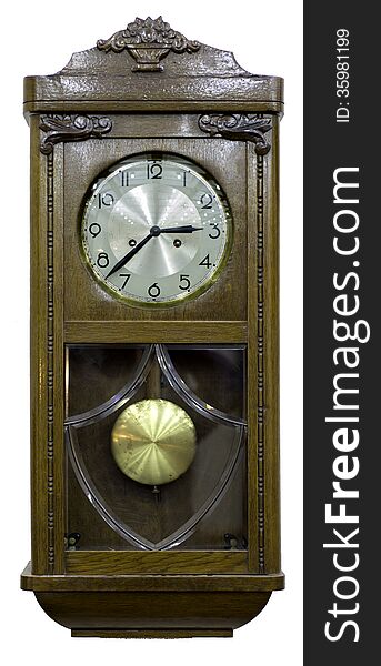 An antique clock isolated on white. An antique clock isolated on white