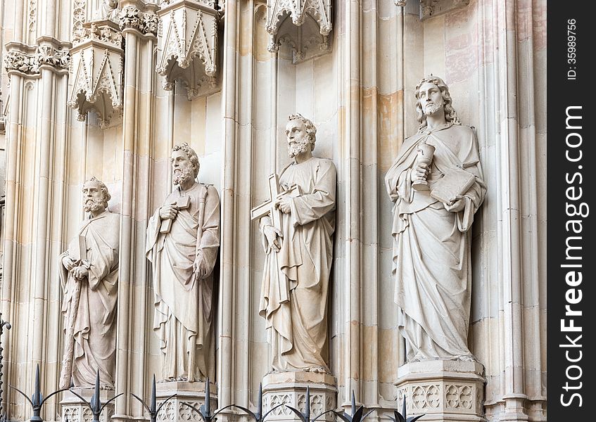 Barcelona cathedral statues of apostles at the entrance, Spain. The cathedral is in the heart of Barri Gotic (Gothic Quarter) of Barcelona. Barcelona cathedral statues of apostles at the entrance, Spain. The cathedral is in the heart of Barri Gotic (Gothic Quarter) of Barcelona