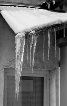 Icicles On The Roof Royalty Free Stock Photos