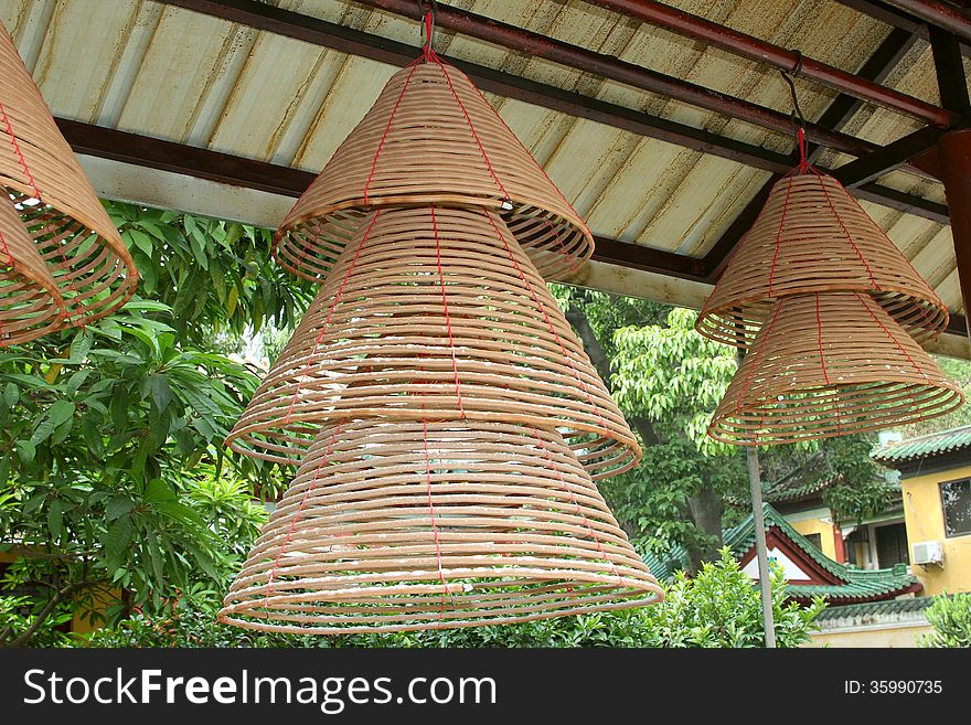 Decorative incense lampions in a Buddhist temple, Zhaoqing, China