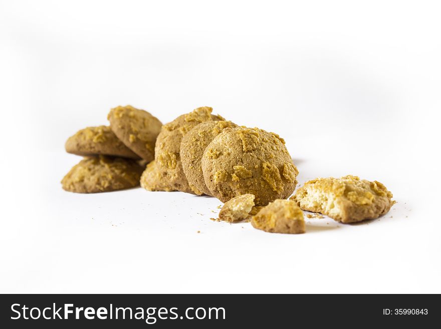 A stack of lemon cookies crumbled