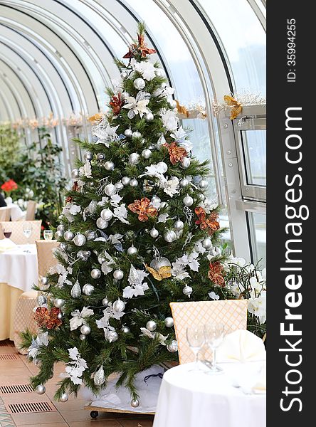 Beautiful festive Christmas tree in the restaurant