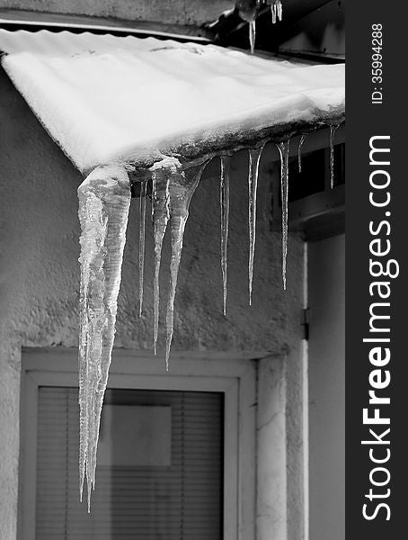 Transparent icicles on the roof