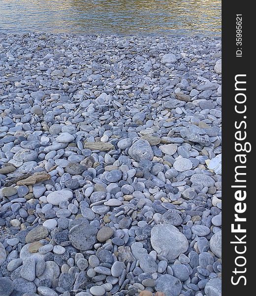 Grey blue pebbles on the beach. Grey blue pebbles on the beach