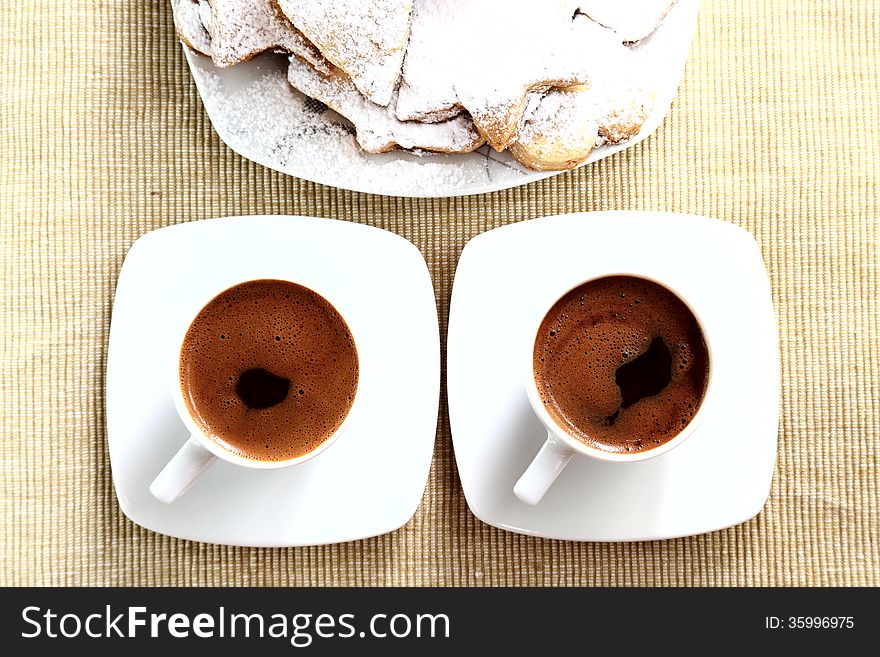 Two Cups Of Coffe With Cookies