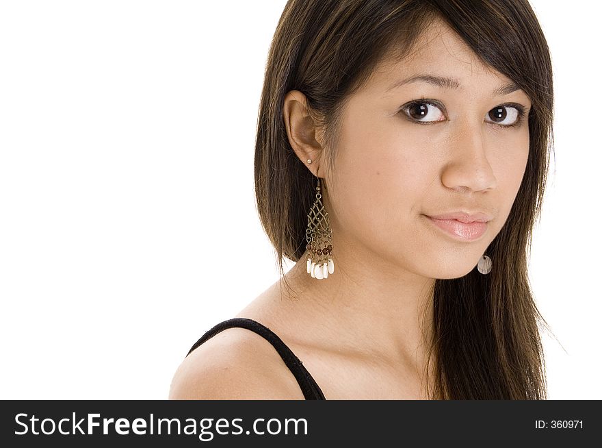 A pretty young teenage girl in a black top on white background. A pretty young teenage girl in a black top on white background