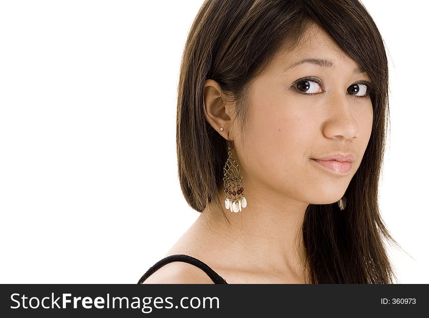 A pretty young asian woman in black on white. A pretty young asian woman in black on white