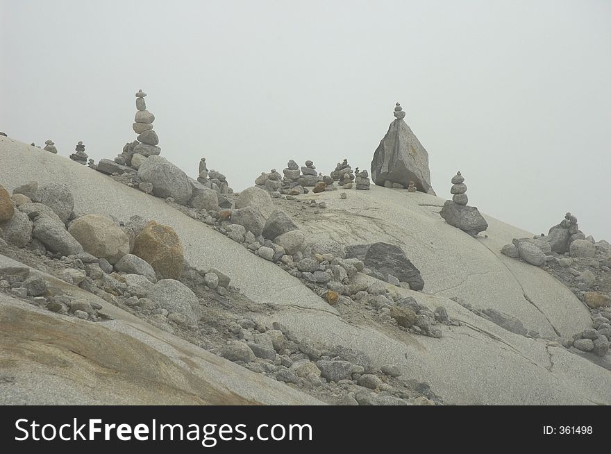 Piles of stones near the ice cave (Eisgrotte am Rhonegletscher) on Furka Pass, Alps, Valais, Switzerland