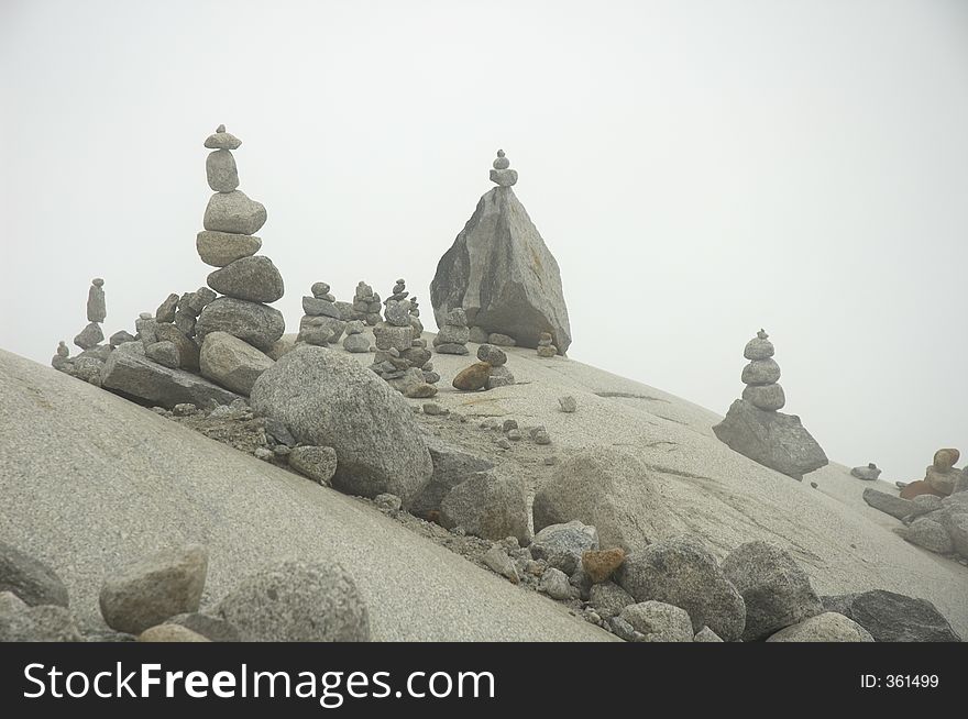 Piles of stones near the ice cave (Eisgrotte am Rhonegletscher) on Furka Pass, Alps, Valais, Switzerland