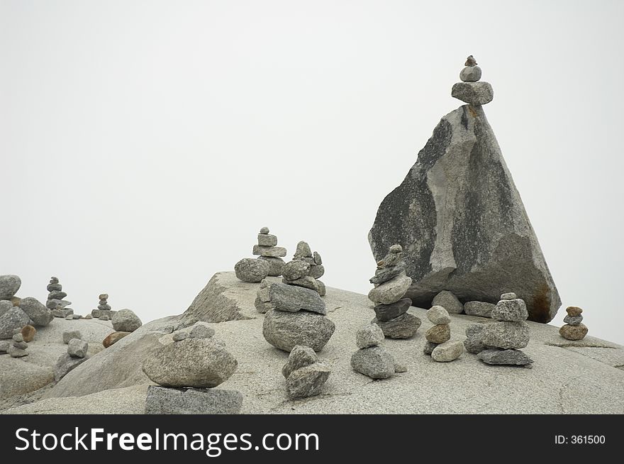 Piles of stones near the ice cave (Eisgrotte am Rhonegletscher) on Furka Pass, Alps, Valais, Switzerland