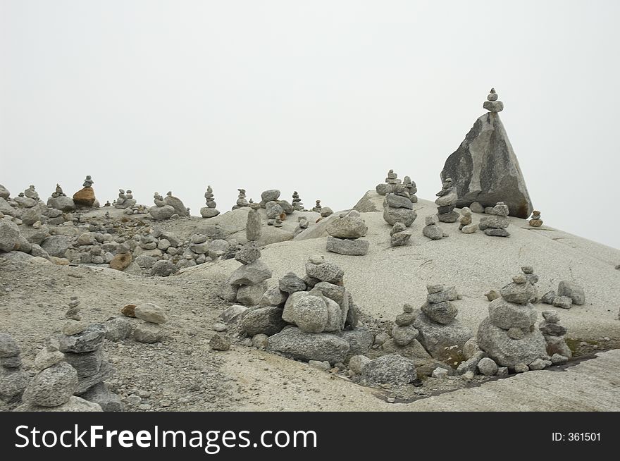 Piles of stones near the ice cave (Eisgrotte am Rhonegletscher) on Furka Pass, Alps, Valais, Switzerland