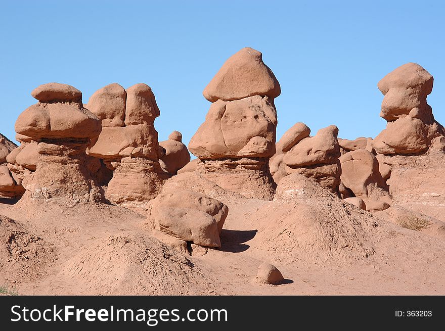 It shows a formation of fantastic rocks in the mushroom valley