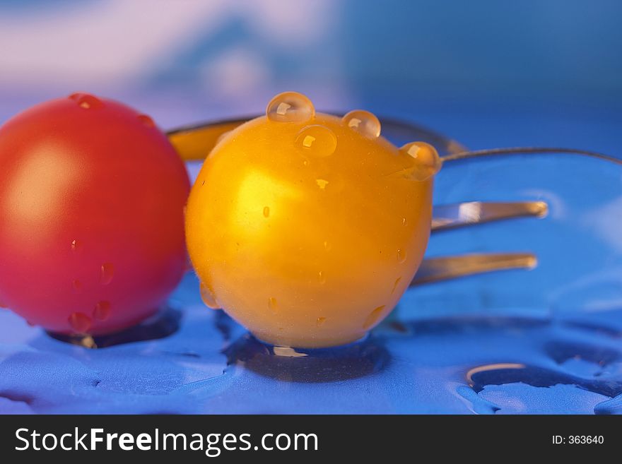 Cherry tomatoes. Close up of red and yellow cherry tomatoes.