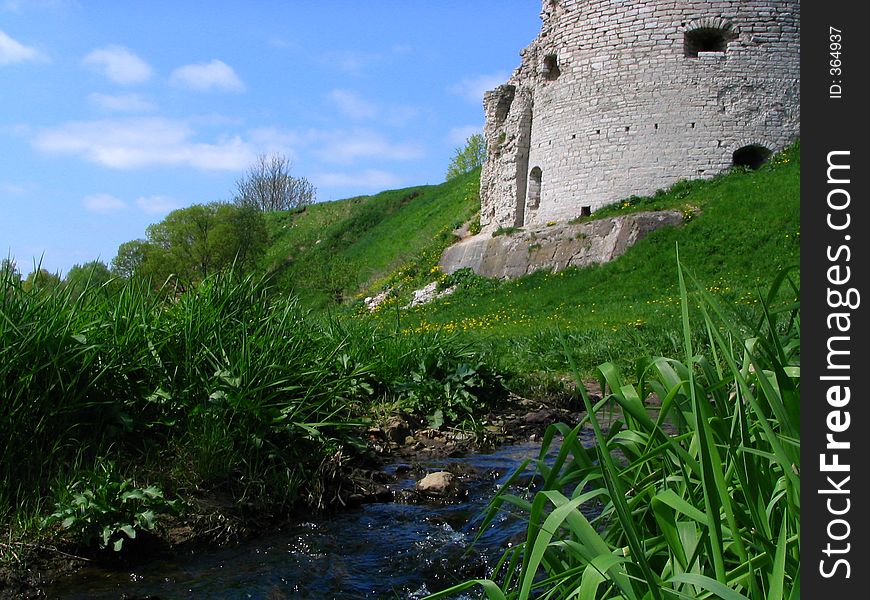 Stream among ruins of a fortress. 14 centuries. Stream among ruins of a fortress. 14 centuries