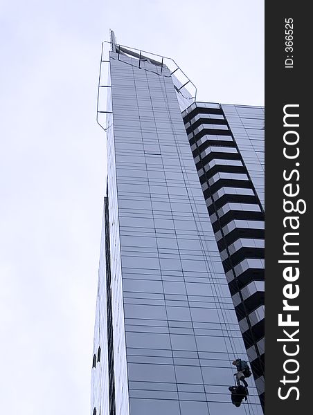 Glass highrise building with scaler. Glass highrise building with scaler