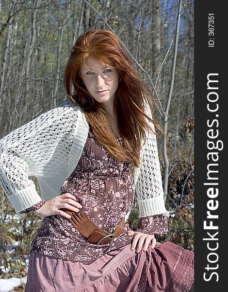 Attractive young redheaded model posing