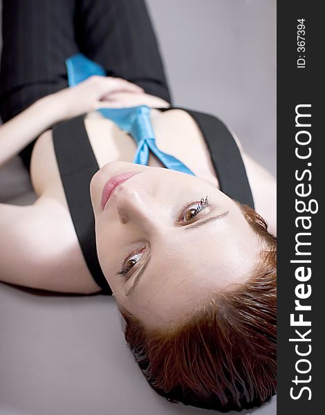 Redhead in tie and suspenders (Shallow DOF). Redhead in tie and suspenders (Shallow DOF)