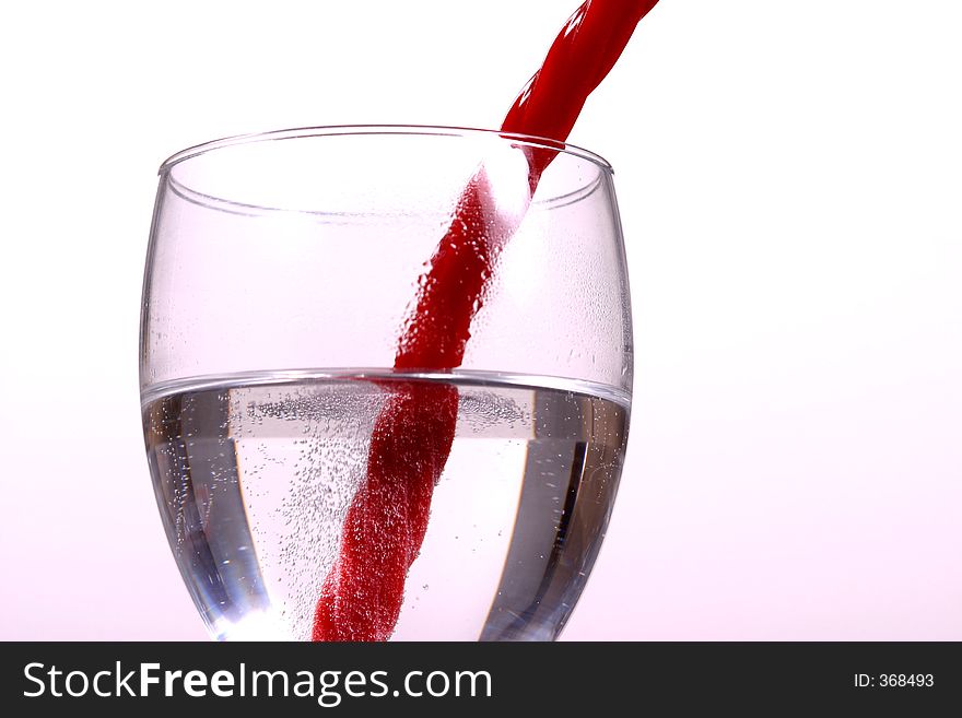 Licorice in a glass of soda. Licorice in a glass of soda