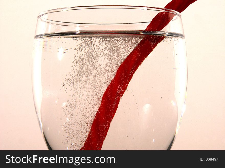 Licorice in a glass of soda. Licorice in a glass of soda