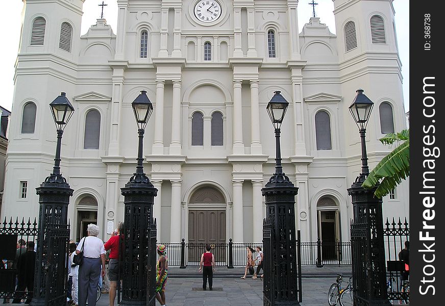 People stand outside the saint louis cathedral