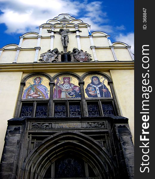 Gothic church over blue cloudy sky