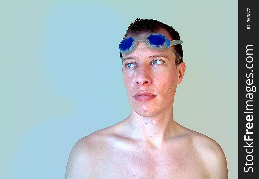 Portrait of man with swimming goggles. Portrait of man with swimming goggles.