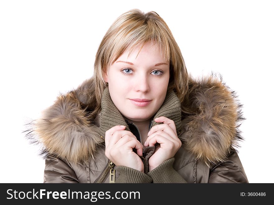 The young girl in a jacket with a fur collar