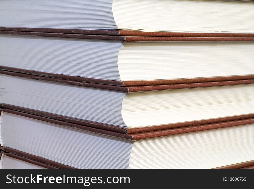 A row of the same old books - close up. A row of the same old books - close up