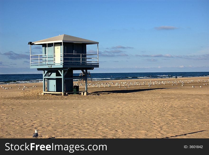 Lifeguard shack on empty beach. Lifeguard shack on empty beach.