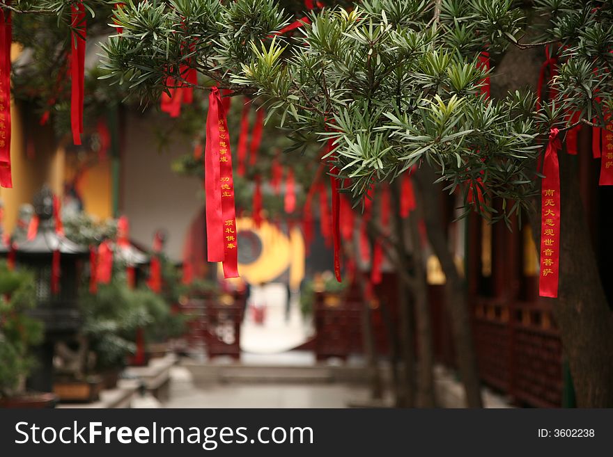 Chinese Red Ribbons on Trees in Buddha Temple