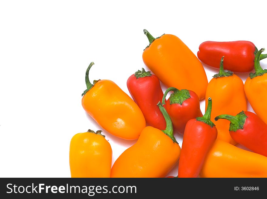 Fresh sweet peppers on white background, with copy space