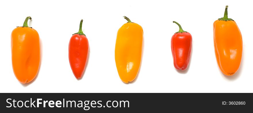 Fresh sweet peppers on white background, with copy space