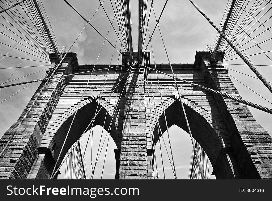 Classic view of the pillars on the Brooklyn Bridge, NYC