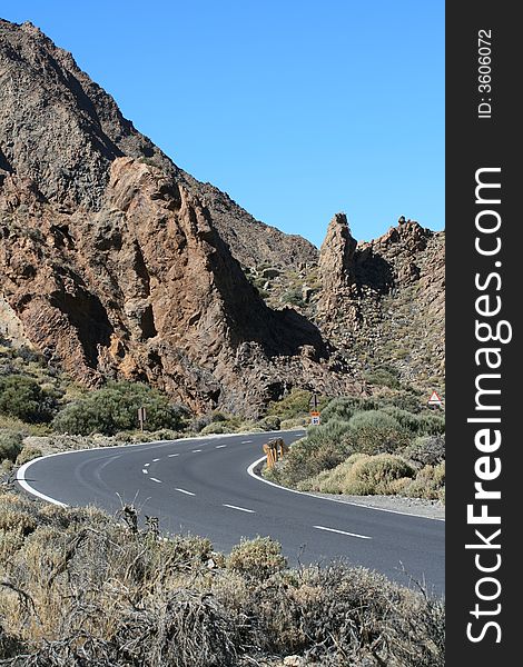 The mountain road and the blue sky as a background.