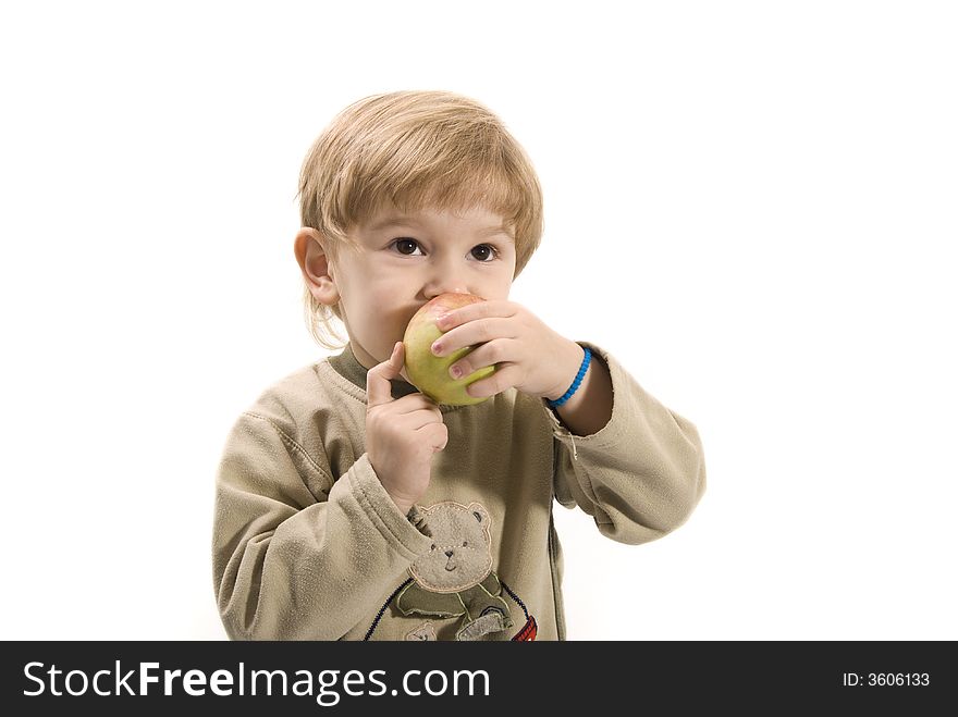 Young girl is eating apple