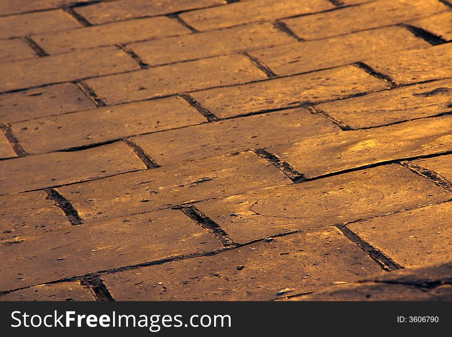 Sunset lit pavement on the Great Wall of China.