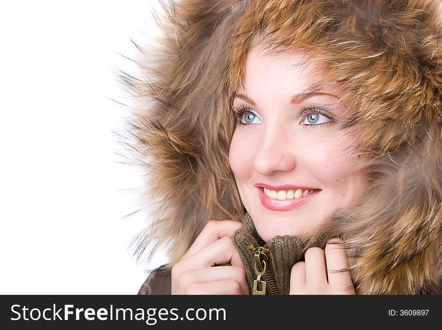 Young woman in a jacket with fur