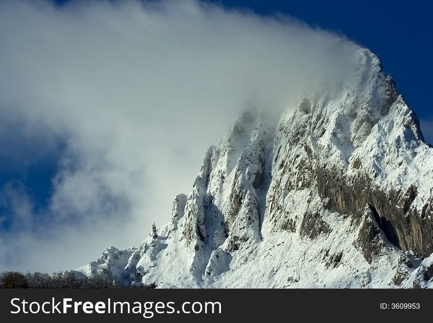 Snow covered beautiful mountain peaks. Snow covered beautiful mountain peaks