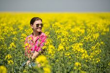 Young Beautiful Woman In Flowering Field In Summer. Outdoors Royalty Free Stock Image Young Beautiful Woman In Flowering Field In Summer. Outdoors Royalty Free Stock Image
