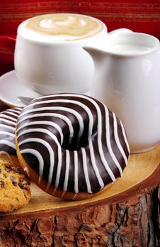 Chocolate Donuts And Cappuccino Royalty Free Stock Photo