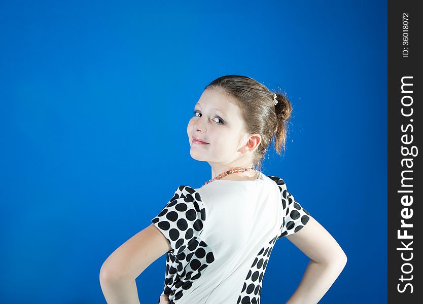 Beautiful Girl On A Blue Background